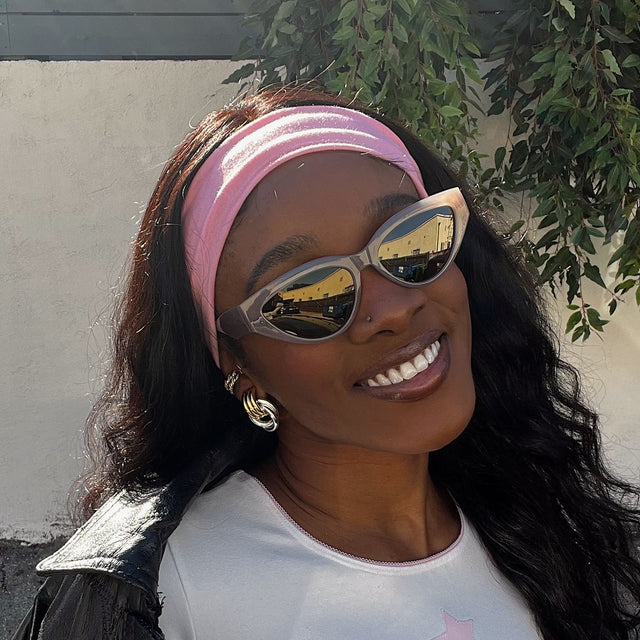 customer content - sayo.akao wearing les do makeup x dime optics featuring last call cat eye sunglasses with a milky nude frame and brown with gold flash polarized lenses front view
