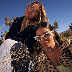 on models - group shot left female wearing fairfax gold and brown with the right female wearing sawtelle in white