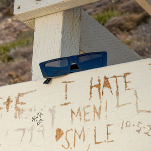 flat lay of dime optics girls night sunglasses in black