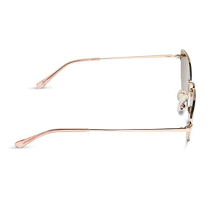 dime optics fairfax cat eye sunglasses with a gold metal frame and gold mirror lenses side view