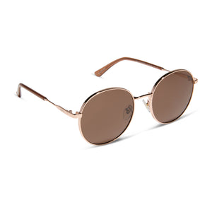 dime optics featuring the silverlake round sunglasses with a champagne gold frame and brown tint lenses angled view