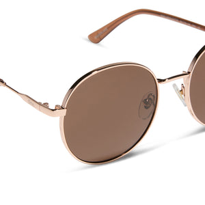 dime optics featuring the silverlake round sunglasses with a champagne gold frame and brown tint lenses detailed view