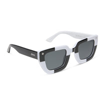 wednesday x dime optics featuring the wednesday addams square sunglasses with a black and white frame with grey polarized lenses angled view