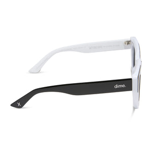 wednesday x dime optics featuring the wednesday addams square sunglasses with a black and white frame with grey polarized lenses side view