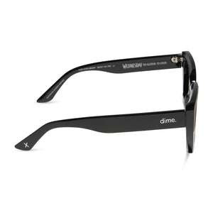 wednesday x dime optics featuring the nevermore academy uniform square sunglasses with a matte black and matte grey frame with grey gradient lenses side view