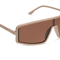 nathalie paris x dime optics mira shield sunglasses with a solid taupe frame and brown polarized lenses detailed view