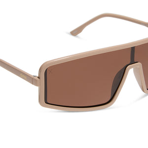 nathalie paris x dime optics mira shield sunglasses with a solid taupe frame and brown polarized lenses detailed view