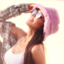 on female model wearing dime optics avalon square sunglasses with a matte black frame and grey mirror lens close up view