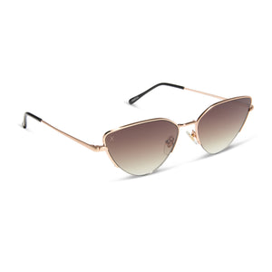 dime optics fairfax cat eye sunglasses with a brushed gold frame and sharp brown gradient lenses angled view